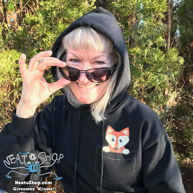 Julie wearing a pocket design hoodie