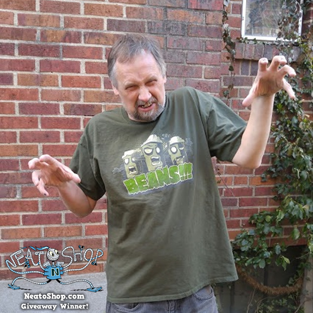 Anthony wearing a coffee design shirt